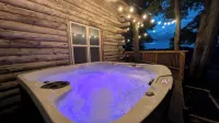 Rustic Retreat Log Cabin Nestled Among 65 Acres