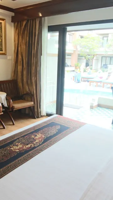 ห้องพักพร้อมทางเข้าสระว่ายน้ำ(เตียงใหญ่)