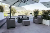 Cyrus&Janus Flats - de Vivo Realty