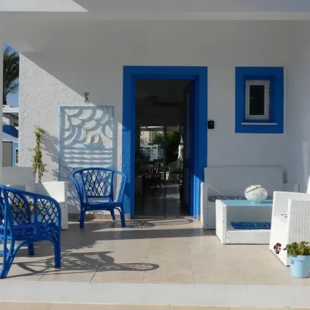 Greek Island Style 2 Bedroom Villa with Pool Next to the Sea