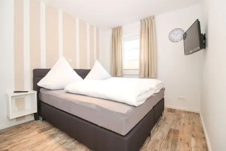 Greetsiel - Spacious apartment on the ground floor Отели в г. Крумхёрн
