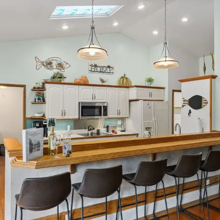 Riverfront property with private beach access with Universal EV Charging Station