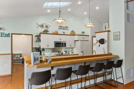 Riverfront property with private beach access with Universal EV Charging Station