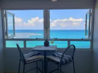 Breezy Beachfront Apt. View of Paradise Hotels in Zarzal