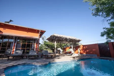 Teufelskrallen Lodge Отели в г. Kalkrand