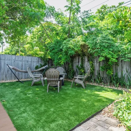 Cozy Coastal Retreat! Fenced Turf Yard • Bikes • Hammock • BBQ • 65” TV