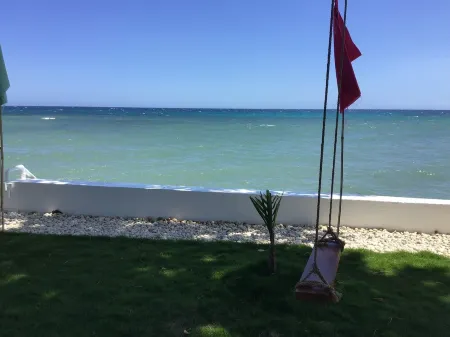 BambooBeachvilla2 NewOCEANFRONT*POOLsunsetview*kitchen STARLINK SAT upto10Guest Отели в г. Dimiao