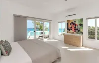 Saffron House Oceanfront and Direct Beachfront 3 BR 2.5 Bath Home
