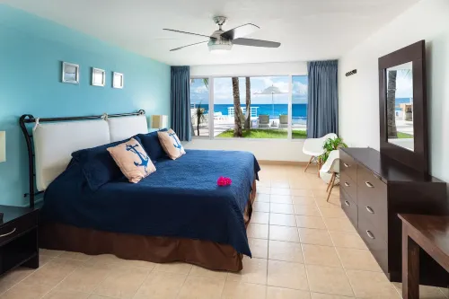Condo 101, Swimming pool level oceanfront condo, Pristine grounds and pool!