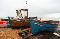 Just one row back from the beach; sea view; family & dog friendly