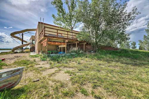Lakefront Country Home w/ Waterslide & Trampoline! - parking