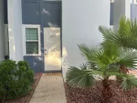 Family Friendly Condo minutes to beach w/ large pool and private outdoor space.