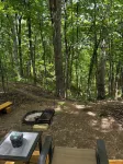 Charming A-frame cabin set in the woods overlooking deep wooded ravines.