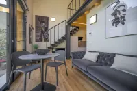 Open space on two floors in detached cottage in ancient medieval courtyard