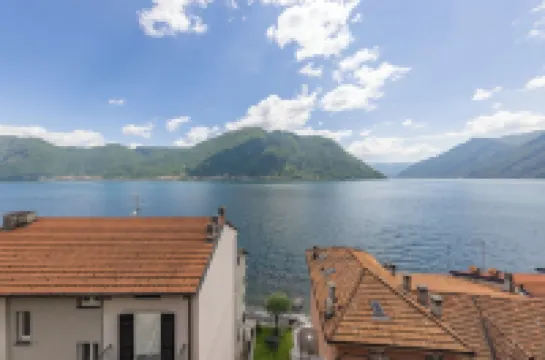 Bright penthouse on Lake Como with breathtaking view.