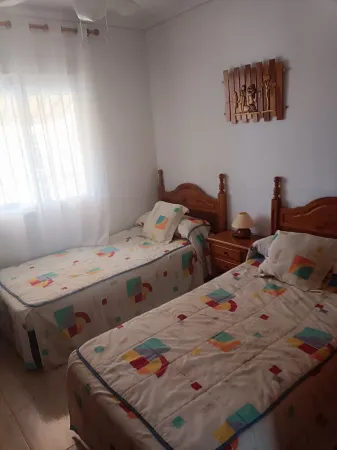 Very bright and fresh bungalow with terrace, swimming pool and close to the best beaches.