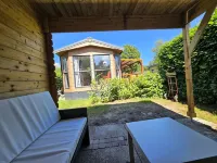 Modern chalet with cozy porch: the Veluwe Feel Good Hotels in Epe