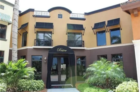 Enjoy This Tropical Getaway with a Full Service Village in Southern Naples!