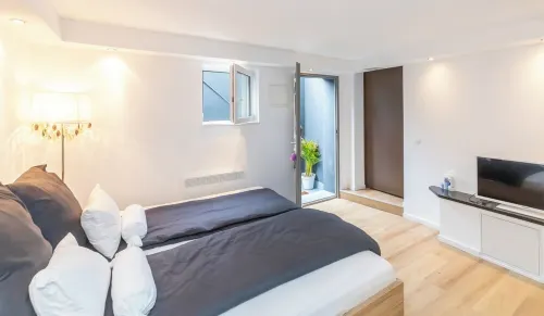 A cozy family home with a spacious garden next to a forest