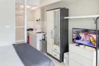 Compact and Warm Studio at Apartment Springlake Summarecon Bekasi By Travelio