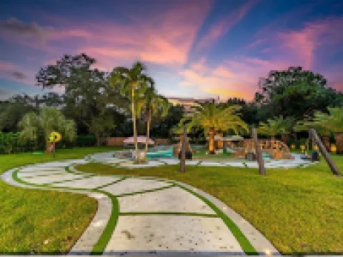 One and Only Lazy River Pool Villa Hotels in Golden Glades