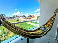 Flats Mar'Bella Com Varanda Para Relaxar e Praia Para Curtir, Garagem Privado e ArCond - homestay