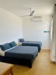 Apartment with mountain view, private balcony and access to beach front terrace. - Homestays