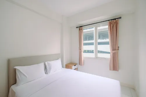 Cozy Stay 2BR Podomoro Golf View Apartment By Travelio Hotels in Gunung Putri