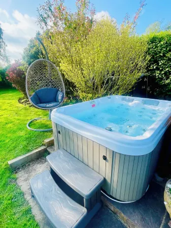 The perfect getaway. Set in stunning gardens overlooking a beautiful lake