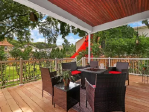 Historic house on tree lined red brick street of historic homes. Hotels in Racine