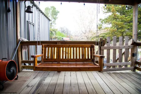 Lake front retreat, covered boat dock, large deck , fenced play area, RV parking