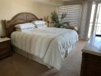 Two bedroom condo with deck overlooking the ocean. Private beach!