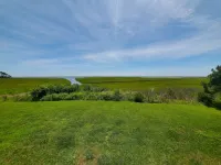 Bayfront cottage offers amazing views of the water and Assateague Island