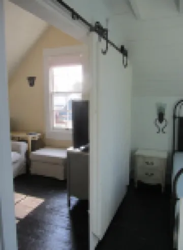 Historic 1887 Carriage House Located On Landmark Property