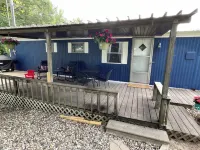 Cozy 2-bedroom campground in peaceful Claypool with AC, WiFi.  Overlooking lake Hotels near Hill Lake