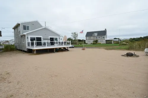 Cozy, year round beachside cottage just steps to the water