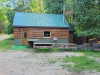 The "Bear Den"  500' Betsie river waterfront Guest home.