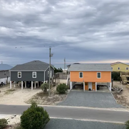 Just steps to the beach, bar, and playground park!
