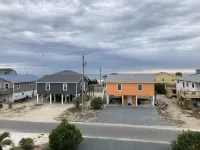 Just steps to the beach, bar, and playground park!