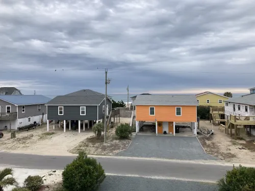 Just steps to the beach, bar, and playground park!