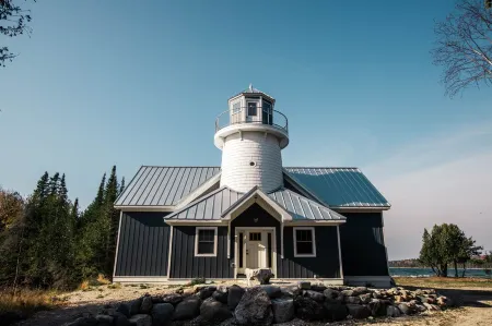 Bois Blanc Island Lighthouse Home. Iconic Sunset Views of the Mackinac Bridge!