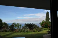 Comfortable home with a beautiful blooming garden and a view of the Atlantic