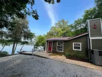 Scenic River Cabin Retreat  Kayaks, Firepit, Hammock & Dog-Friendly Stay