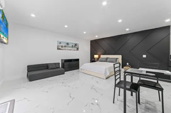 XL Luxury Room. Luxurious studio retreat with sleek designs.
