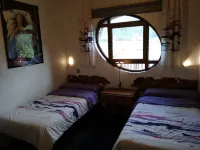 Hobbit House (bioclimatic and half-buried with green cover