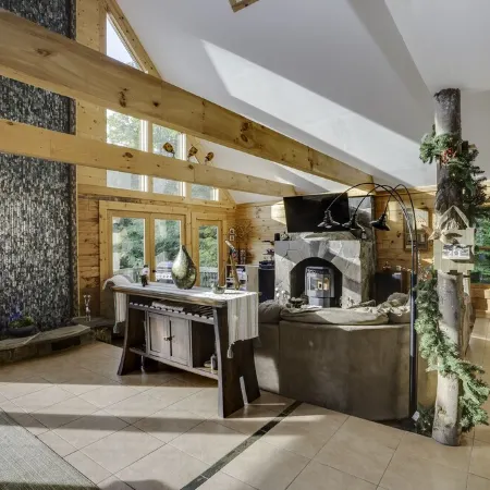 Secluded modern log cabin with picturesque private water fall on 12 acres!