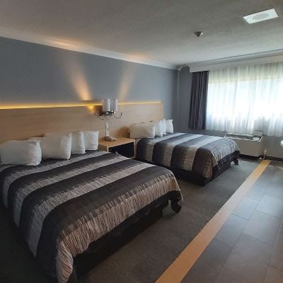 Deluxe Room, 2 Queen Beds, Non Smoking, Includes Waterpark Passes For Four Guests Americana Waterpark Resort & Spa Promo Code