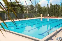Heliconia Park - Port Harcourt Hotel - piscina