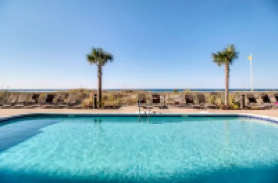 Oceanfront condo with epic gulf view, shared pool & hot tub, free WiFi, & W/D