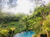 The Riverside Javanese Cottages Отели в г. Pakem